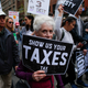 Protesters in New York Cuty call on President Donald Trump to release his tax records April 15, 2017. (Jena Betancur/AFP/Getty Images)